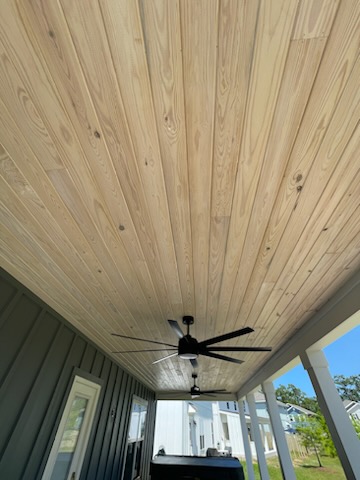 Covered outdoor living addition