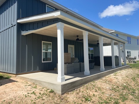 Finished porch with wood ceiling