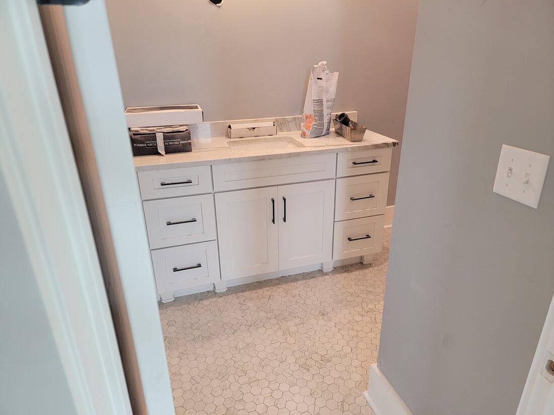 Bathroom vanity, countertop, and finish trim