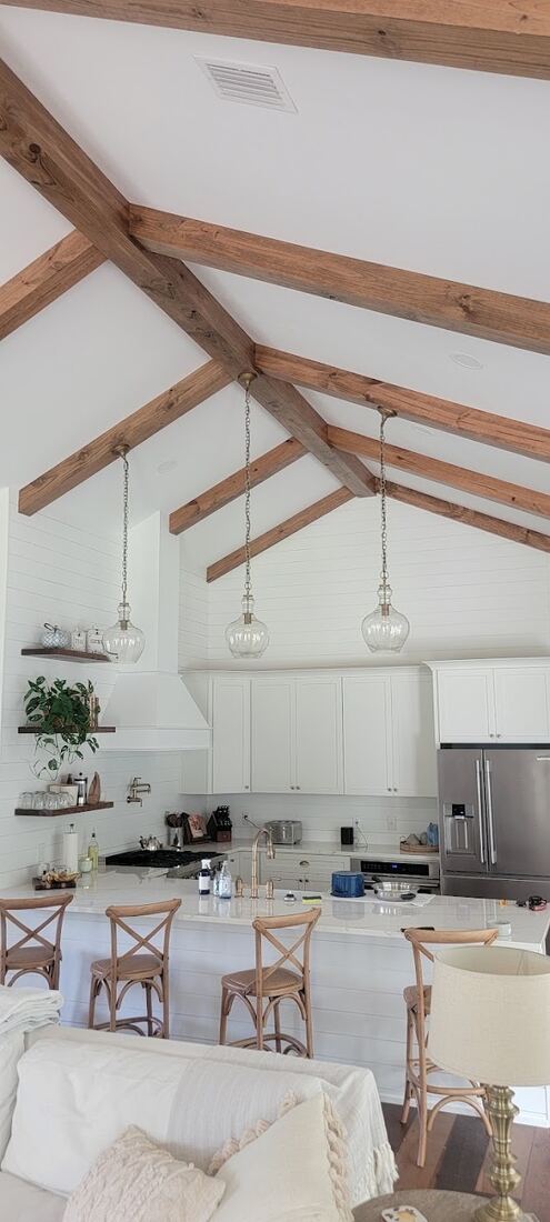 Vaulted interior with decorative beam work